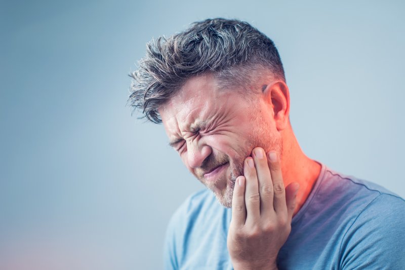 patient suffering from dry socket